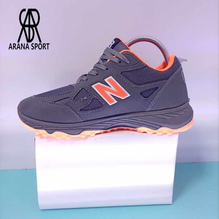 نمای کنار کتونی نیوبالانس زیره نرم مردانه