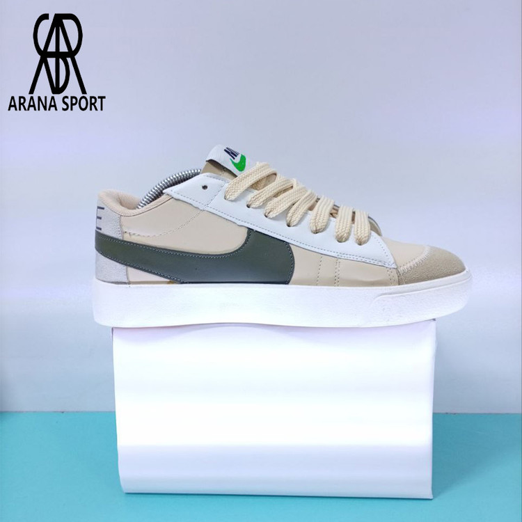 نمای کنار کفش نایک ترویست کرم سبز مردانه